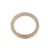 AN 18 CARAT GOLD AND DIAMOND PENDANT