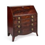 A GEORGE III MAHOGANY SLANT-FRONT BUREAU