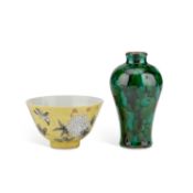 A CHINESE YELLOW-GROUND BOWL AND A CHINESE GREEN-GLAZED VASE