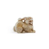 A CHINESE JADE CARVING OF A BIXIE