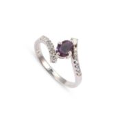 A CONTEMPORARY DIAMOND AND AMETHYST RING