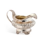 A WILLIAM IV SILVER CREAM JUG OR MILK JUG