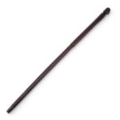 A 19TH CENTURY CARVED HARDWOOD CANE
