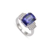 AN 18 CARAT WHITE GOLD TANZANITE AND DIAMOND DRESS RING