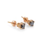 A PAIR OF 10K GOLD BLACK DIAMOND STUD EARRINGS