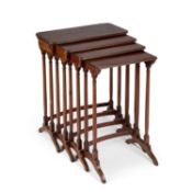 A SET OF FOUR REGENCY MAHOGANY NESTING TABLES