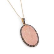 A LARGE ROSE QUARTZ AND DIAMOND PENDANT ON CHAIN