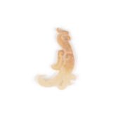 A CHINESE ZOOMORPHIC JADE PENDANT