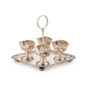 AN UNUSUAL VICTORIAN SILVER-PLATED EGG CRUET