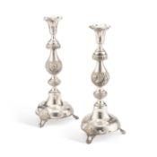 JUDAICA: A PAIR OF RUSSIAN SILVER SABBATH CANDLESTICKS