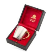 STUART DEVLIN: AN ELIZABETH II PARCEL-GILT SILVER ROYAL COMMEMORATIVE MUG