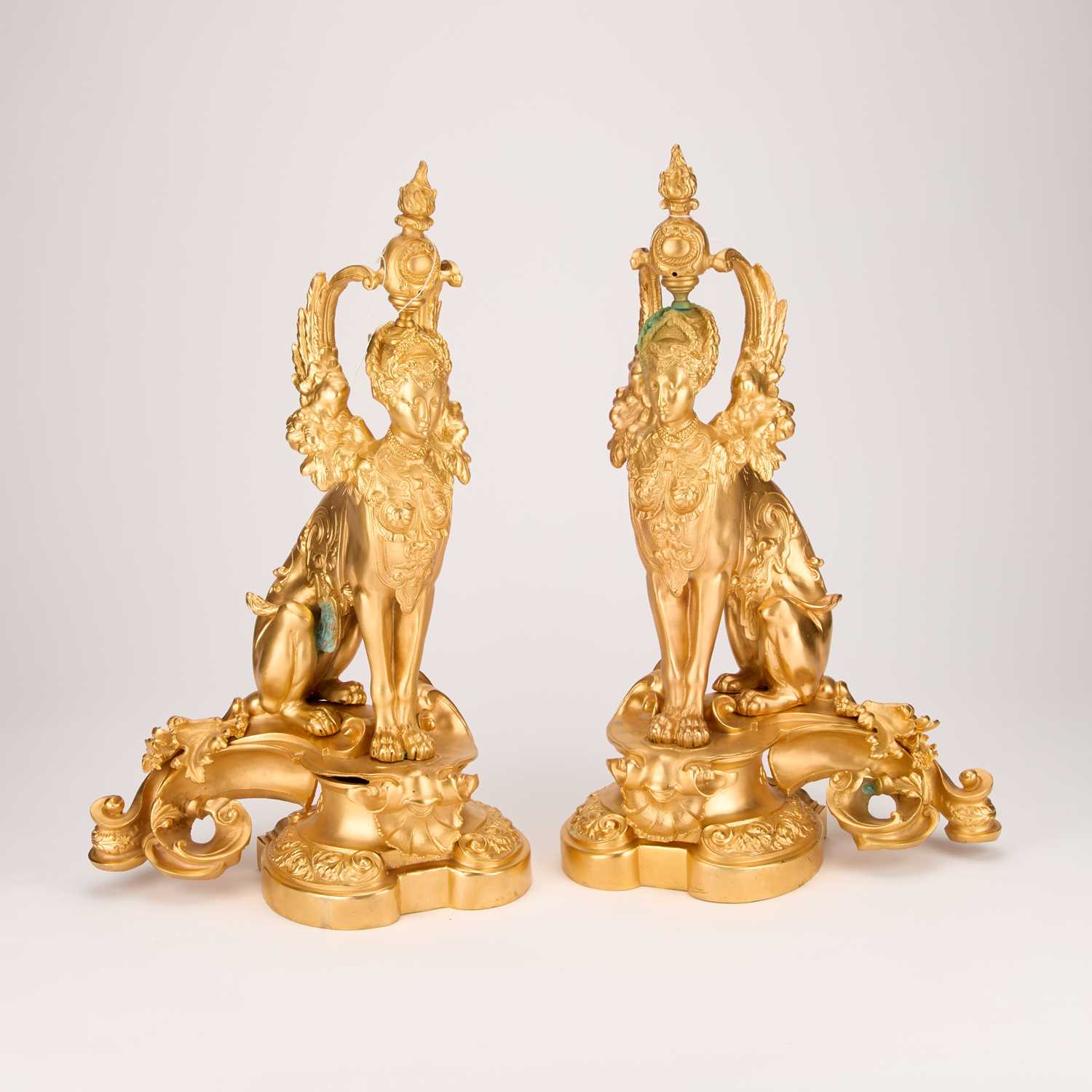 A PAIR OF 19TH CENTURY GILT-METAL CHENETS