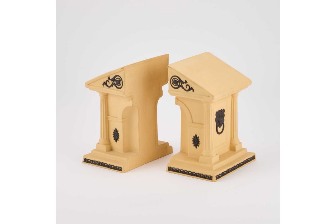 A PAIR OF WEDGWOOD YELLOW JASPERWARE LIBRARY COLLECTION BOOKENDS