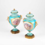 A PAIR OF 19TH CENTURY FRENCH SEVRES STYLE VASES AND COVERS