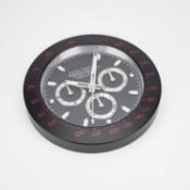 AN ADVERTISING WALL CLOCK, SIGNED OYSTER PERPETUAL COSMOGRAPH DAYTONA