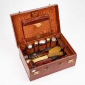 A FINNIGANS LTD CROCODILE LEATHER TRAVELLING CASE