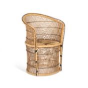 A VINTAGE RATTAN PEACOCK CHAIR