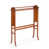 A LATE 19TH CENTURY INLAID SATINWOOD TOWEL RAIL