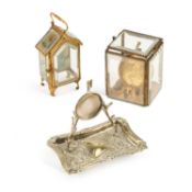 A GROUP OF THREE POCKET WATCH STANDS