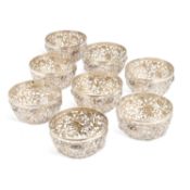 A FINE SET OF EIGHT CHINESE SILVER PIERCED BOWLS