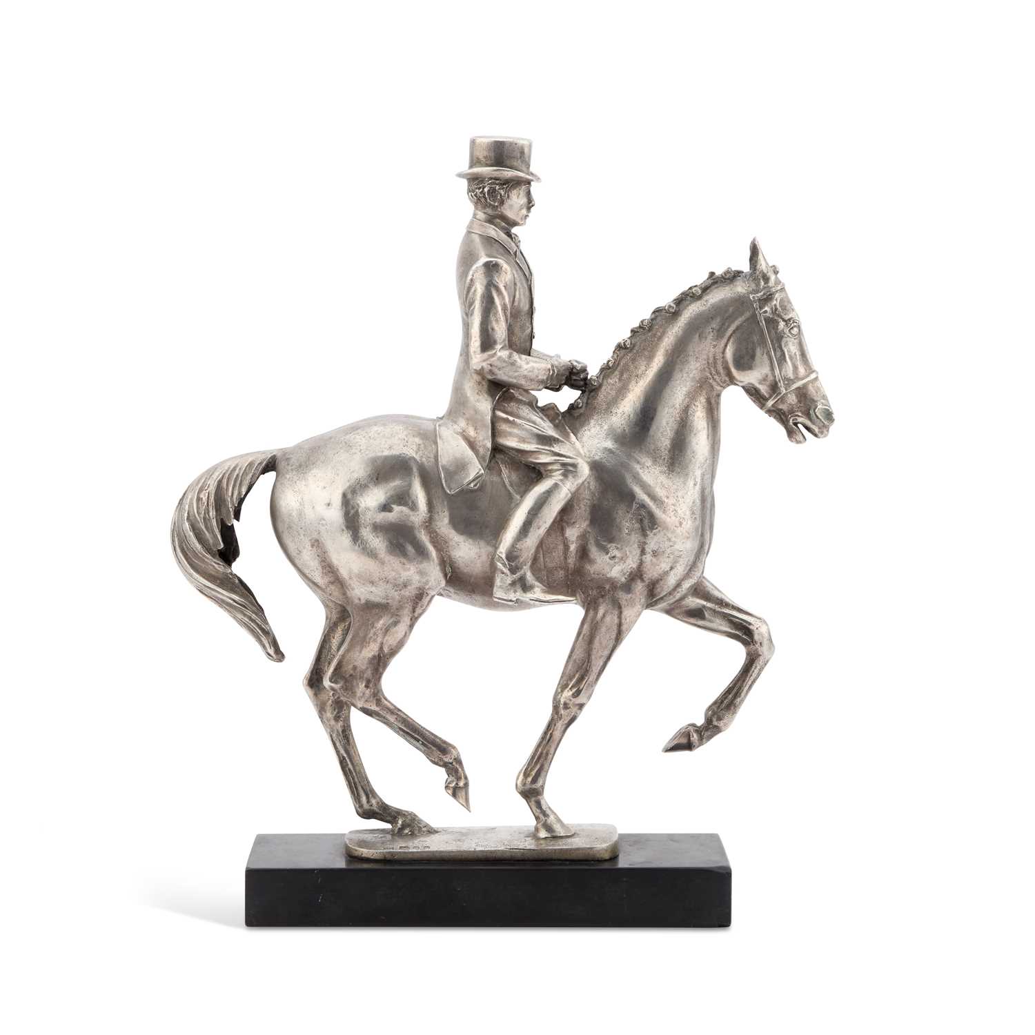 A LARGE CAST SILVER MODEL OF A HORSE AND RIDER, MODELLED BY BERNARD WINSKILL (D.1980)