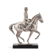 A LARGE CAST SILVER MODEL OF A HORSE AND RIDER, MODELLED BY BERNARD WINSKILL (D.1980)