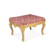 A VICTORIAN GILDED AND UPHOLSTERED STOOL, LABEL OF GILL & REIGATE, LONDON