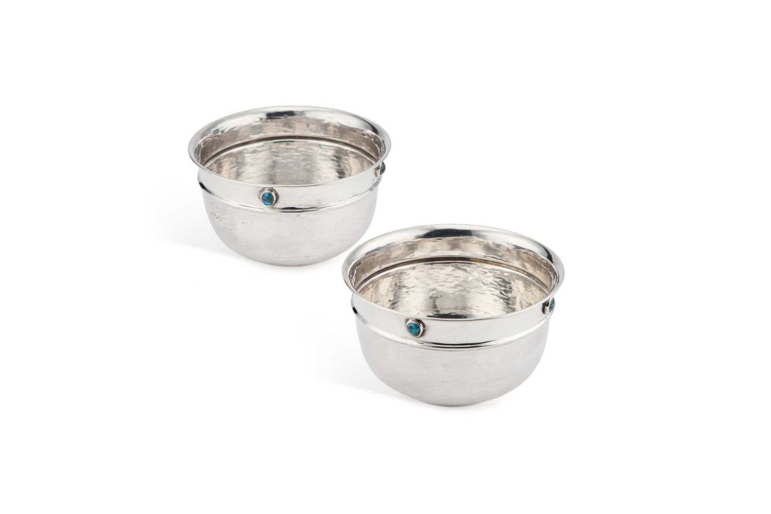 LIBERTY & CO: A PAIR OF ARTS AND CRAFTS SILVER BOWLS