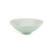 A CHINESE CELADON-GROUND BOWL