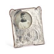 A RARE EDWARDIAN SILVER-MOUNTED PHOTOGRAPH FRAME