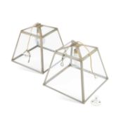 A PAIR OF CONTEMPORARY WROUGHT IRON AND GLASS HANGING LANTERNS