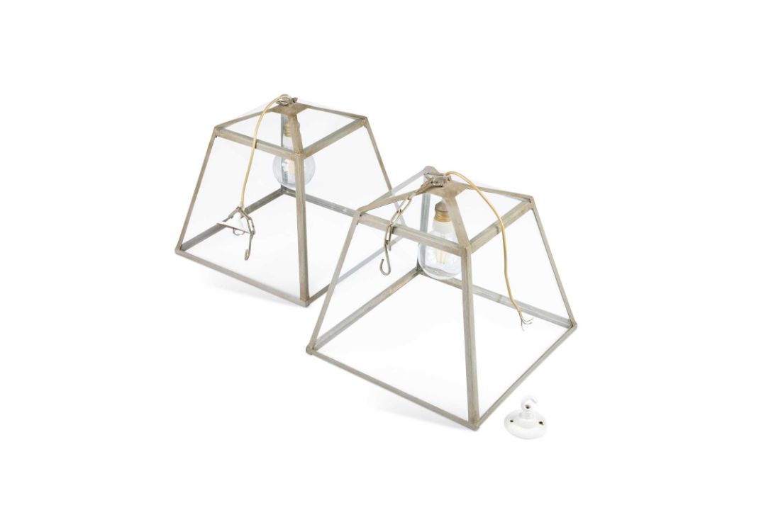 A PAIR OF CONTEMPORARY WROUGHT IRON AND GLASS HANGING LANTERNS