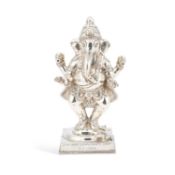 AN INDIAN SILVER FIGURE OF GANESH