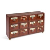 A BANK OF MAHOGANY APOTHECARY DRAWERS, LATE 19TH/EARLY 20TH CENTURY