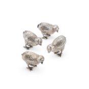 A SET OF FOUR CONTINENTAL SILVER NOVELTY SALT AND PEPPER POTS