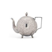 AN ANGLO-INDIAN SILVER TEAPOT