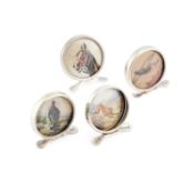 FOUR GEORGE V SILVER AND HAND-PAINTED MENU HOLDERS