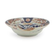 A JAPANESE IMARI PORCELAIN BARBER'S BOWL, 18TH CENTURY