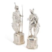 A PAIR OF CONTINENTAL SILVER FIGURES OF STANDING KNIGHTS