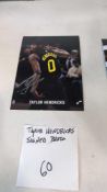 Taylor Hendricks signed photo