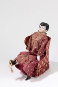 Doll with armchair, 1880-1890