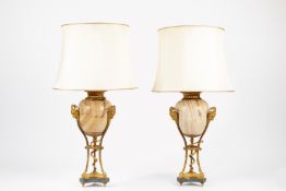 Pair of neoclassical gilt bronze mounted alabaster vases