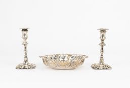 A silver Edward VIII basket and two small candlesticks