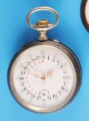 Large metal pocket watch with 24-hour dial and red scale from 1-12,