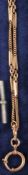 Thin, gold-plated pocket watch chain,