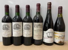 Eight assorted vintage French red wines