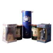 Six commemorative Bell's whisky decanters