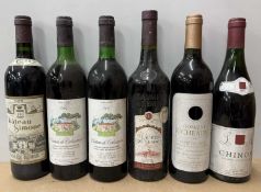 Nine full and three half bottles of assorted French vintage wines