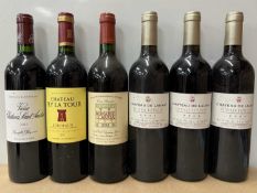 Six assorted vintage Bordeaux region wines