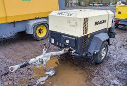 Doosan 7/41 diesel driven fast tow mobile air compressor Year: 2013 S/N: 431976 Recorded Hours: 2210